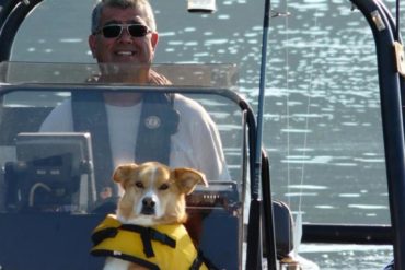 Man and dog on a boat