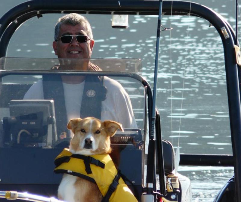 Man and dog on a boat